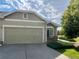 Attached two-car garage and driveway of a well maintained house in a residential neighborhood at 14400 Albrook Dr # 88, Denver, CO 80239