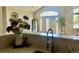 Bright kitchen area features a breakfast bar, modern faucet, and plenty of natural light at 14400 Albrook Dr # 88, Denver, CO 80239