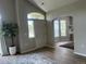 Open floor plan features living room, office and entry at 14400 Albrook Dr # 88, Denver, CO 80239