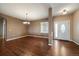 Dining Room features gorgeous hardwood floors and a large bright window at 22873 E David Pl, Aurora, CO 80016