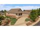 Inviting home with a two-car garage, cozy front porch, and beautifully landscaped front yard at 22873 E David Pl, Aurora, CO 80016