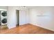Bright bedroom features hardwood floors, closet and stackable washer/dryer hookups for added convenience at 1250 S Monaco Pkwy # 44, Denver, CO 80224