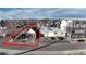 A street view of a duplex and warehouse-style property at 3905-3907 Inca, Denver, CO 80211