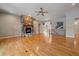 Living room with hardwood floors, stone fireplace and open floor plan at 34989 Forest Park Dr, Elizabeth, CO 80107