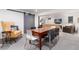 Basement rec room with dining table and comfortable seating areas at 3925 S Cherry St, Englewood, CO 80113