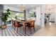 Bright dining room with large windows offering beautiful views of the outdoors at 3925 S Cherry St, Englewood, CO 80113