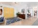 Inviting entryway with a colorful front door, hardwood floors, and stylish decor at 3925 S Cherry St, Englewood, CO 80113