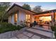 Beautiful modern home showcasing an inviting outdoor patio with stylish furniture and landscaping at 3925 S Cherry St, Englewood, CO 80113