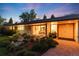 Charming single-story home with manicured landscaping and inviting entryway at 3925 S Cherry St, Englewood, CO 80113