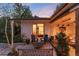 Outdoor patio features a fire pit and cozy seating with bedroom views at 3925 S Cherry St, Englewood, CO 80113