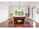 Game room with hardwood floors, a pool table, a stylish light fixture, and natural light at 6616 E Prentice Ave, Greenwood Village, CO 80111