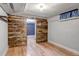 Finished basement with wood paneling and an open door to the Devil's Fiddle game room at 3151 N Elizabeth St, Denver, CO 80205
