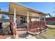 A covered patio with ample seating space and an open-air design at 1300 Kennedy Dr, Northglenn, CO 80234