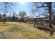 A spacious backyard with a swing set, offering a great outdoor play area for children and Gathering enjoyment at 1300 Kennedy Dr, Northglenn, CO 80234