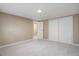 Unfinished basement featuring neutral walls and a closet at 5222 S Emporia Way, Greenwood Village, CO 80111