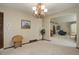 Formal dining room with chandelier and hardwood floors at 5222 S Emporia Way, Greenwood Village, CO 80111