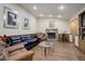 Living room with a stone fireplace and hardwood floors at 5222 S Emporia Way, Greenwood Village, CO 80111