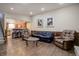 Open concept living room with a view into the kitchen area at 5222 S Emporia Way, Greenwood Village, CO 80111