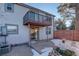 Private patio with a balcony and seating area at 5222 S Emporia Way, Greenwood Village, CO 80111