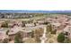 Aerial view of the neighborhood featuring a pool and lush common green space at 9450 Sori Ln, Highlands Ranch, CO 80126