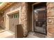 Charming front entrance with stone accents and a well-maintained garage door at 9450 Sori Ln, Highlands Ranch, CO 80126