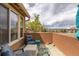 Private outdoor patio with comfortable seating and views of the surrounding landscape at 9450 Sori Ln, Highlands Ranch, CO 80126