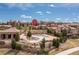 Community pool surrounded by lush landscaping and well-maintained homes on a sunny day at 9450 Sori Ln, Highlands Ranch, CO 80126