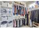 Walk-in closet with ample space for storage and organization at 1558 White Violet Way, Louisville, CO 80027