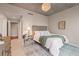 Cozy bedroom with neutral tones, an overhead chandelier, and comfortable furnishings at 1620 Little Raven St # 103, Denver, CO 80202