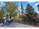 Relax on the patio featuring views of the city, greenery, seating, and perfect for city living at 1620 Little Raven St # 103, Denver, CO 80202
