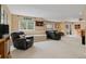 Spacious finished basement featuring carpeted floors and a seating area, perfect for recreation at 9249 Fox Fire Dr, Highlands Ranch, CO 80129