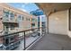 Spacious balcony overlooking the city and neighboring buildings at 1863 Wazee St # 6E, Denver, CO 80202