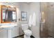 Bathroom with pedestal sink, toilet and glass shower at 1863 Wazee St # 6E, Denver, CO 80202