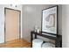 Inviting entryway with modern decor, hardwood floors, and stylish console table creates a welcoming ambiance at 1863 Wazee St # 6E, Denver, CO 80202