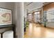 Bright living area featuring exposed pipes and oversized windows with natural light and modern decor at 1863 Wazee St # 6E, Denver, CO 80202