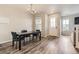 Inviting dining area featuring wood floors and ample natural light at 23545 E Platte Dr # C, Aurora, CO 80016