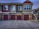 Beautiful townhome showcasing stone accents, multiple car garage and private entrance at 23545 E Platte Dr # C, Aurora, CO 80016