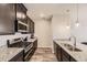 Well-equipped kitchen with granite countertops and stainless steel appliances at 23545 E Platte Dr # C, Aurora, CO 80016