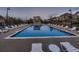 Community pool with lounge chairs and outdoor seating for relaxing in the sun at 23545 E Platte Dr # C, Aurora, CO 80016