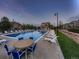 Community pool with lounge chairs and outdoor seating for relaxing in the sun at 23545 E Platte Dr # C, Aurora, CO 80016
