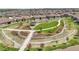 Aerial view of community park with walking trails and green spaces at 25059 E Alder Dr, Aurora, CO 80016