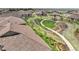 Community aerial view highlighting lush landscaping, walking path, and convenient access to homes at 25059 E Alder Dr, Aurora, CO 80016