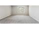 A spacious bedroom with neutral walls and carpet, offering a serene and inviting atmosphere at 3823 Horiuchi St, Brighton, CO 80601