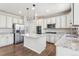 Modern kitchen featuring granite countertops, stainless steel appliances, and a large island at 3823 Horiuchi St, Brighton, CO 80601