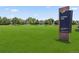 Community park with a large grassy area and sign; Farmers Park in Brighton, Colorado at 3823 Horiuchi St, Brighton, CO 80601