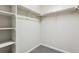 A well-organized walk-in closet features ample shelving and hanging space at 3823 Horiuchi St, Brighton, CO 80601