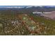 Aerial view of the property highlighting its location within the national forest at 14800 Gold Hill Rd, Boulder, CO 80302