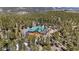 A charming wood home with a green roof and solar panels nestled in a lush forest setting at 14800 Gold Hill Rd, Boulder, CO 80302
