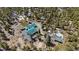 Aerial view of a property with a green roof, deck, and small outbuilding at 14800 Gold Hill Rd, Boulder, CO 80302