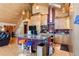 Kitchen with stainless appliances, granite countertops, wooden cabinetry, and center island at 14800 Gold Hill Rd, Boulder, CO 80302